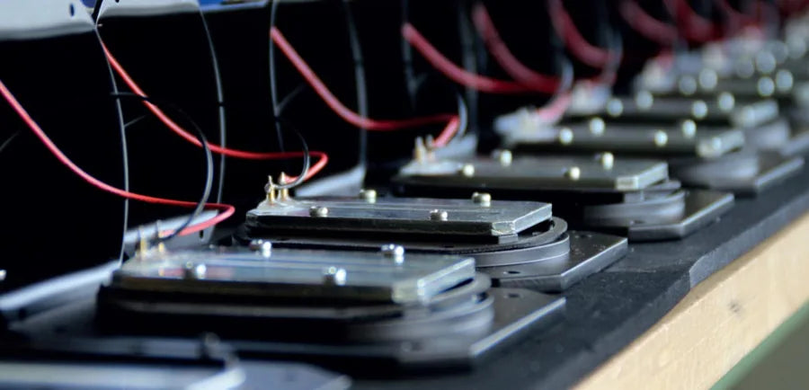 Loudspeaker driver assemblies during production at Visaton